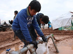 3. As their financial resources dwindle, displaced populations are forced to live in some of the poorest areas further burdening already vulnerable host communities. Limited health services and low vaccination coverage rates among children increase their risk of contracting vaccine-preventable diseases, such as measles or polio. Lack of safe water and sanitation increase the risk of waterborne diseases, such as malaria and cholera. Credit: WHO 3. As their financial resources dwindle, displaced populations are forced to live in some of the poorest areas further burdening already vulnerable host communities. Limited health services and low vaccination coverage rates among children increase their risk of contracting vaccine-preventable diseases, such as measles or polio. Lack of safe water and sanitation increase the risk of waterborne diseases, such as malaria and cholera. Credit: WHO