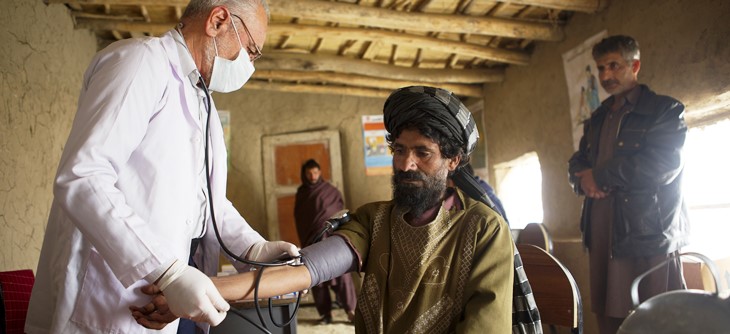 Man is examined by a doctor in a mobile clinic supported by WHO in a Kabul IDP camp PHOTO WHO R Akbar Man is examined by a doctor in a mobile clinic supported by WHO in a Kabul IDP camp PHOTO WHO R Akbar