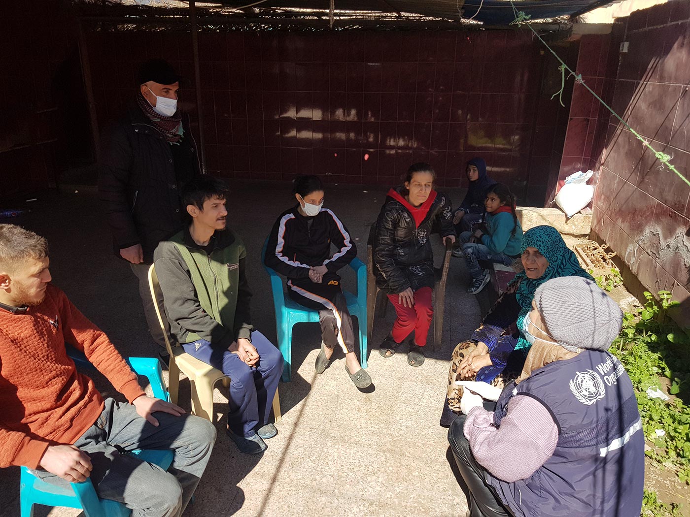 Om Molham with her children after recovery