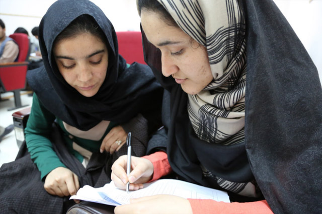 A week before vaccination campaign, the polio workers start preparing. More than 70,000 volunteer vaccinators and other polio workers are selected and trained in vaccination, finger marking and campaign monitoring. In Herat, students Jami Mansoora (left) and Asma Hakimi (right) were trained as campaign monitors.