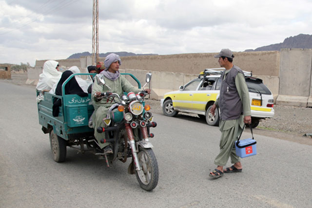 Credit: WHO Afghanistan/J.Jalali 5) Reaching children in inaccessible areas Permanent transit teams (PTTs) help to reach children in inaccessible areas with vaccines. Currently 387 permanent transit teams, up from 163 in 2016, are stationed in strategically selected locations such as informal border crossings, busy transport hubs, major market places, health facilities and entry/exit points of inaccessible areas. The teams vaccinated over 10 million children in 2016. The number of PTTs is constantly modified according to the evolving security and access situation. The successful prevention of secondary cases and possible further transmission in Kunduz province in 2017 can be attributed to the 66 permanent transit teams placed around and inside the inaccessible areas of the province after house-to-house vaccination campaigns were banned.