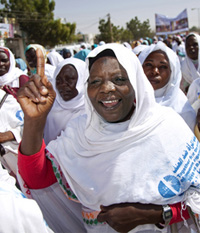 A group of smiling women at a gender in health and development event