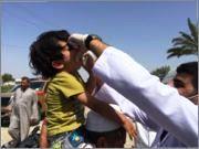 Child_given_oral_polio_vaccine