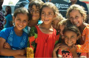Children_from_Debaga_camp_smile_for_the_camera