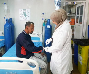 A male patient receives treatment at primary health care centre established by WHO in Ba’ja town