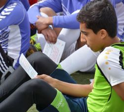 Footballer_reading_information_on_TB Footballer_reading_information_on_TB