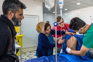 Injured child of Mr. Firas being examined by emergency doctors in Erbil Emergency Hospital