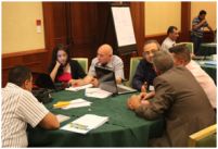 Public health, research and surveillance officers from the national TB programme discuss development of protocols during the workshop on operational research methodology and proposal development 