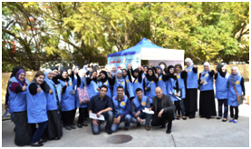 Students gathering in front of the smoke-free tent