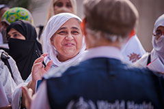 A Lady Health Worker smiles as she starts her day as part of the campaign team in Peshawar city