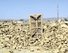 A scene of devastation following the earthquake with houses destroyed