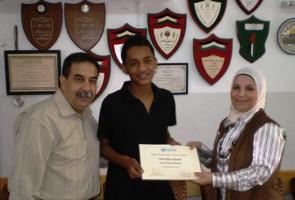 From_left_Mohammad_Mttor_Principal_Ramallah_Secondary_School_Fuad_Al_Yamani_First_Prize_Award_winner_and_Dr._Tasneem_Atatrah_WHO_oPt_Right_to_Health_Advocacy_Unit From_left_Mohammad_Mttor_Principal_Ramallah_Secondary_School_Fuad_Al_Yamani_First_Prize_Award_winner_and_Dr._Tasneem_Atatrah_WHO_oPt_Right_to_Health_Advocacy_Unit