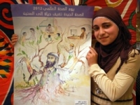 Sondos_Raed_Helmi_with_her_First_Prize_winning_picture