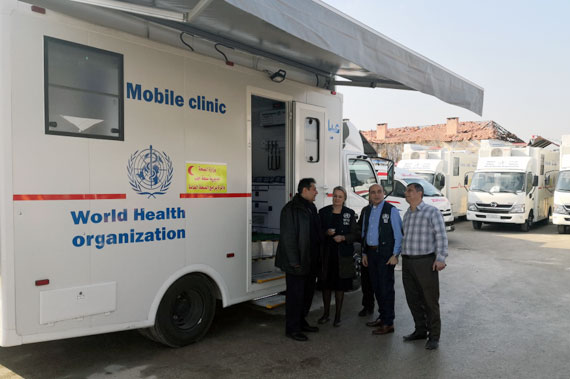 Elizabeth Hoff, WHO Representative in Syria, hands over the mobile clinics and ambulances donated by the Government of Japan to the Director of Health in Aleppo