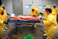Syrian hospital staff are trained on personal protective equipment, emergency decontamination of patients, and life-saving clinical care
